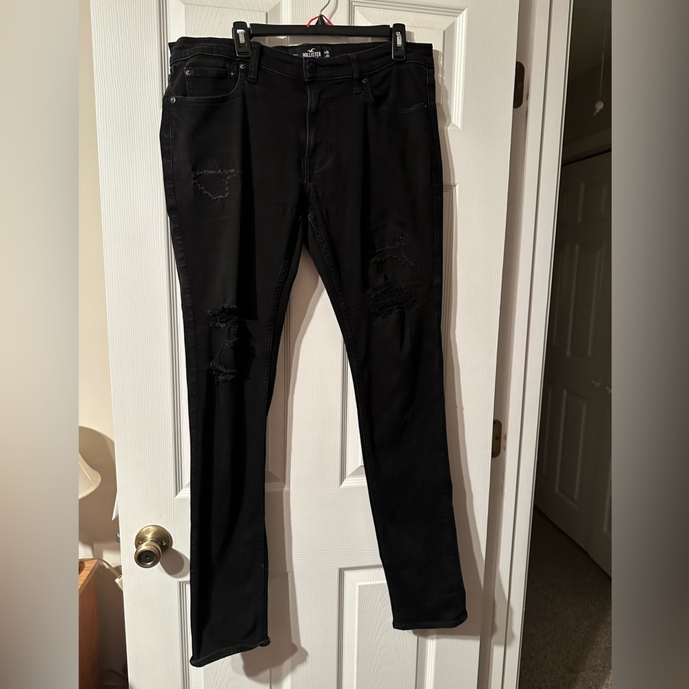 Men’s Hollister black distressed jeans. 36x32 relaxed fit, skinny leg